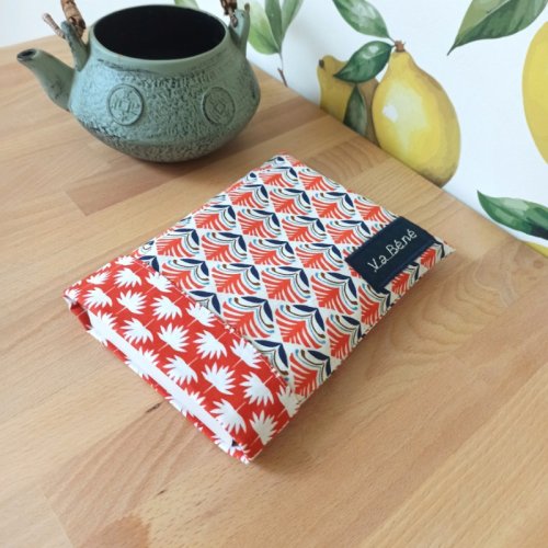 poche-a-livre-motif-geometrique-orange-1